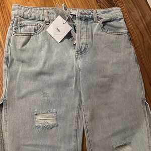 Light Blue Jeans opened on the side